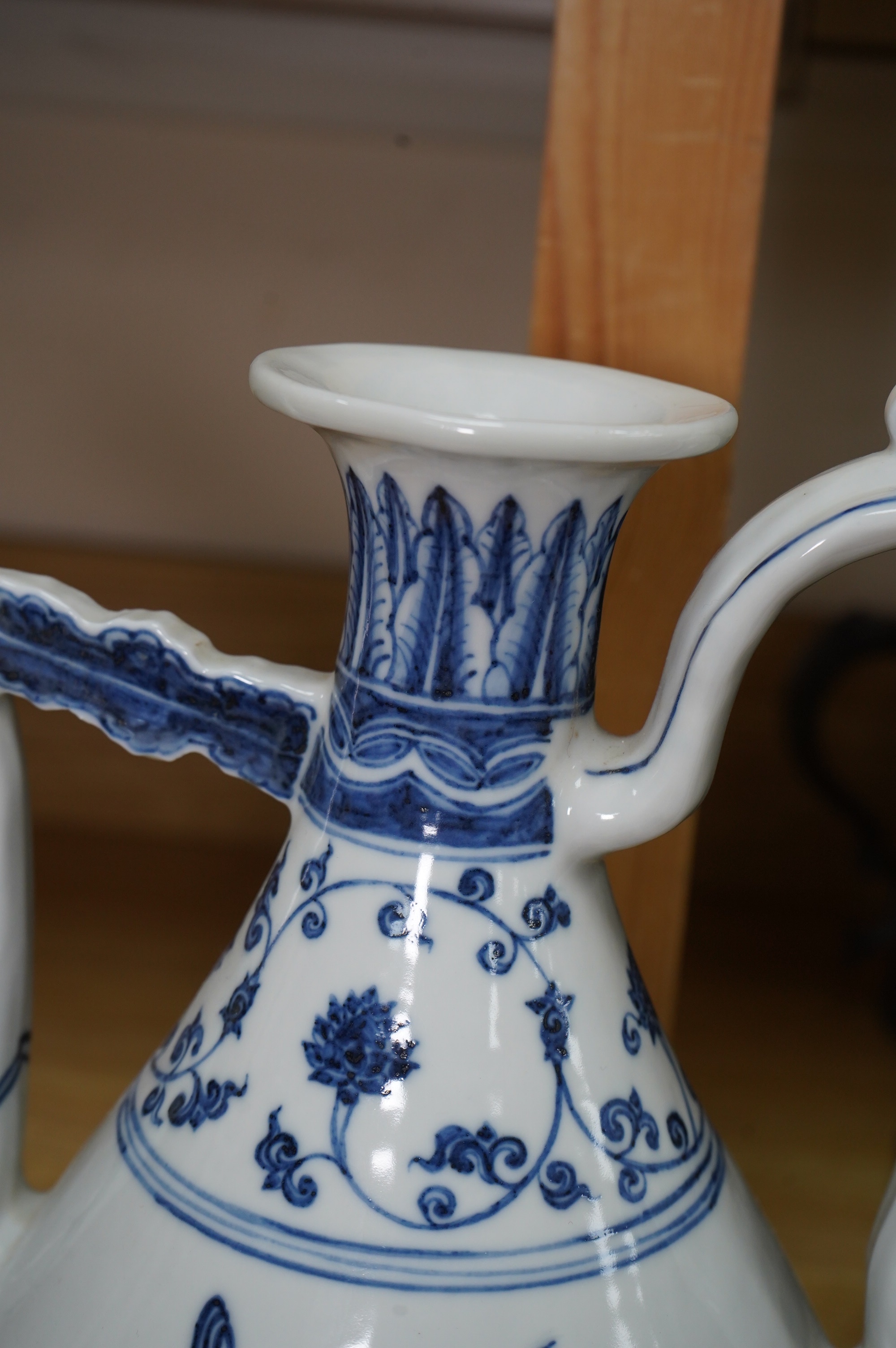 A large Chinese blue and white porcelain ewer, 31cm high. Condition - good